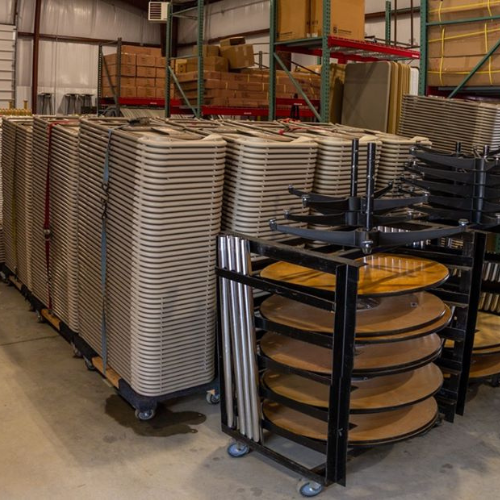 Stacked tables and chairs