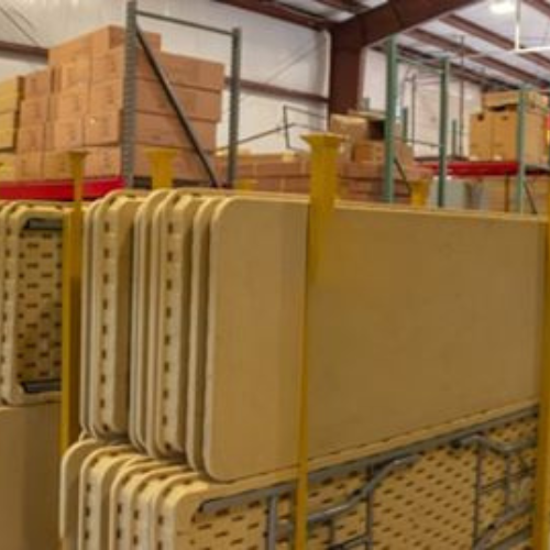 Stacked tables and chairs