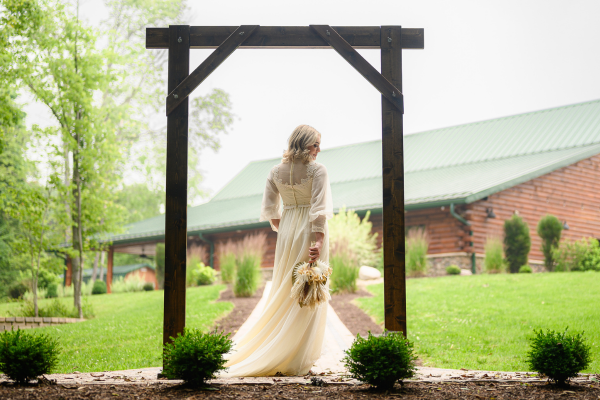 Bride standing under a platform